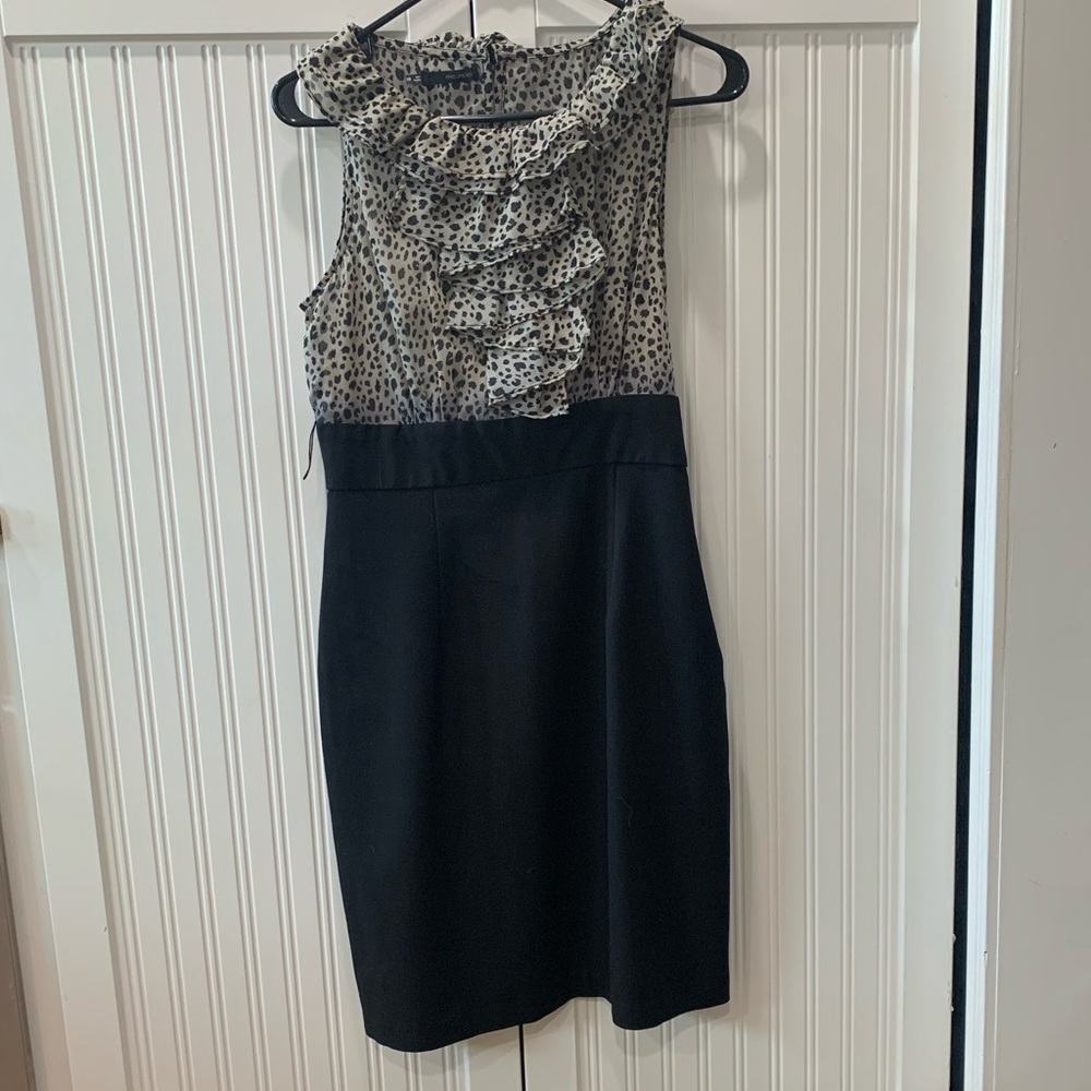 Mid-thigh length dress.